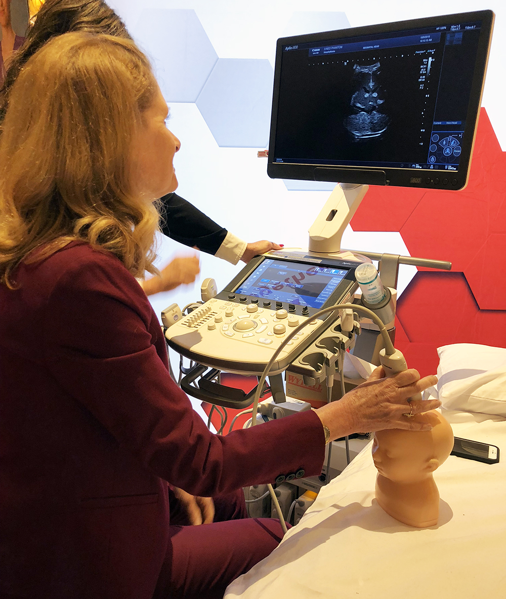 photo of Charlotte Henningsen scans neonatal head phantom at the 2018 SDMS Conference in
Orlando, FL.