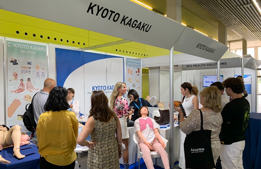 Kyoto Kagaku booth with visitors